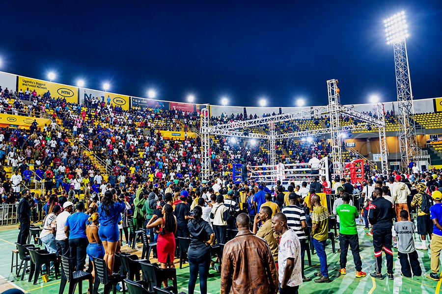 A section of fans watch the first-ever Uganda Boxing Champions League (UBCL) event hosted under the floodlights of Hamz Stadium. Photo by FRED KISEKKA