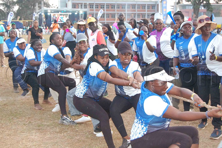 Members of Goretti House in a tug-of-war action. (Photo by Mathias Mazinga)