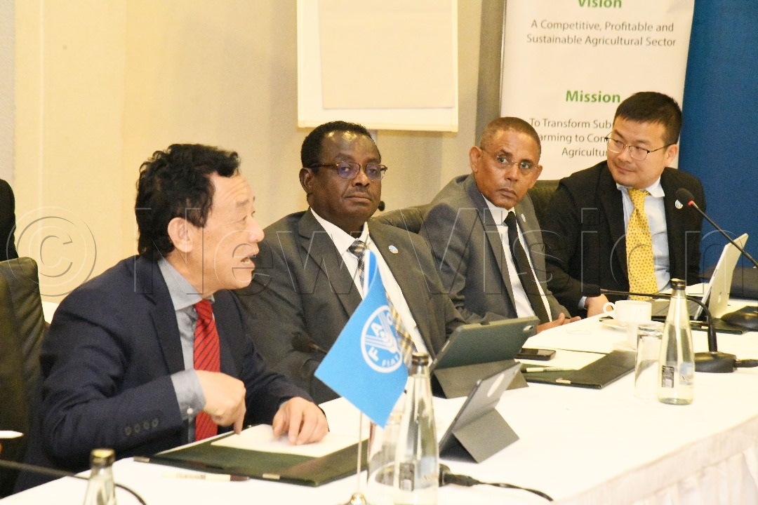 Dr Qu Dongyu, Director General, FAO, Abebe Haile Gabriel, Assistant Director General for Africa; Yergalem Taages Baraki, Country Representative to Uganda; and Shen Hong, Assistant to the Director General, during the meeting at Kampala Serena Hotel on Tuesday, July 22, 2025. (Credit: Mpalanyi Ssentongo)