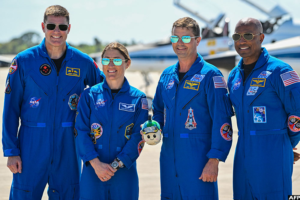 The four astronauts set to carry out the Moon voyage (from left): Jeremy Hansen, Christina Koch, Reid Wiseman and Victor Glover pictured during a welcome ceremony ahead of the launch at Kennedy Space Center in Florida on March 27, 2026. (AFP)