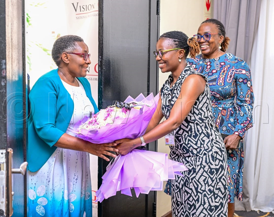 Outgoing Editor-in-Chief Barbara Kaija received with a bouquet of flowers.