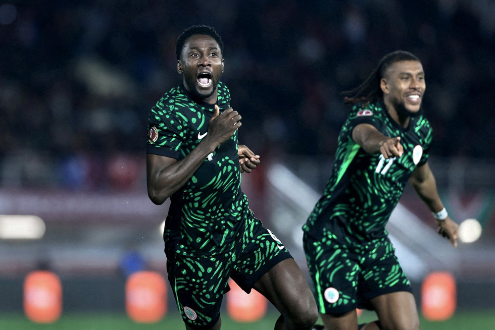 Players of Nigeria celebrate after scoring a goal during the 35th Africa Cup of Nations (AFCON 2025) Group c match between Nigeria and Tunisia at Fez Stadium in Fez, Morocco, on December 27, 2025. (Photo by Fareed Kotb / Anadolu via AFP)