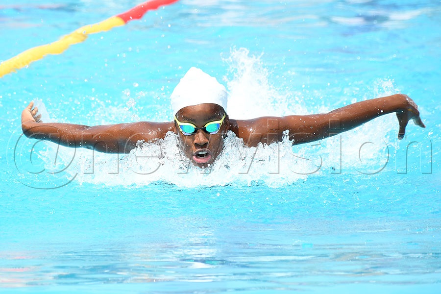 British School Kampala's Peyton Mary Suubi in action during 100m butterfly race of the USSSA Swimming championship at Seroma High School pool. Photo by Michael Nsubuga