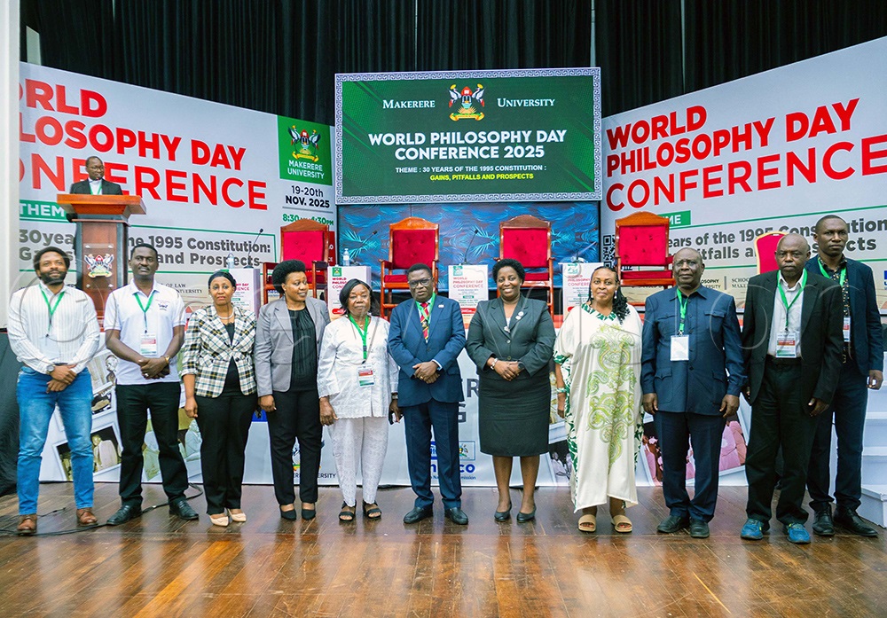 Justice and constitutional affairs minister Norbert Mao (centre) with guests and officials from Makerere University during the World Philosophy Day celebrations held at Makerere University Main Hall. (Photo by John Odyek)