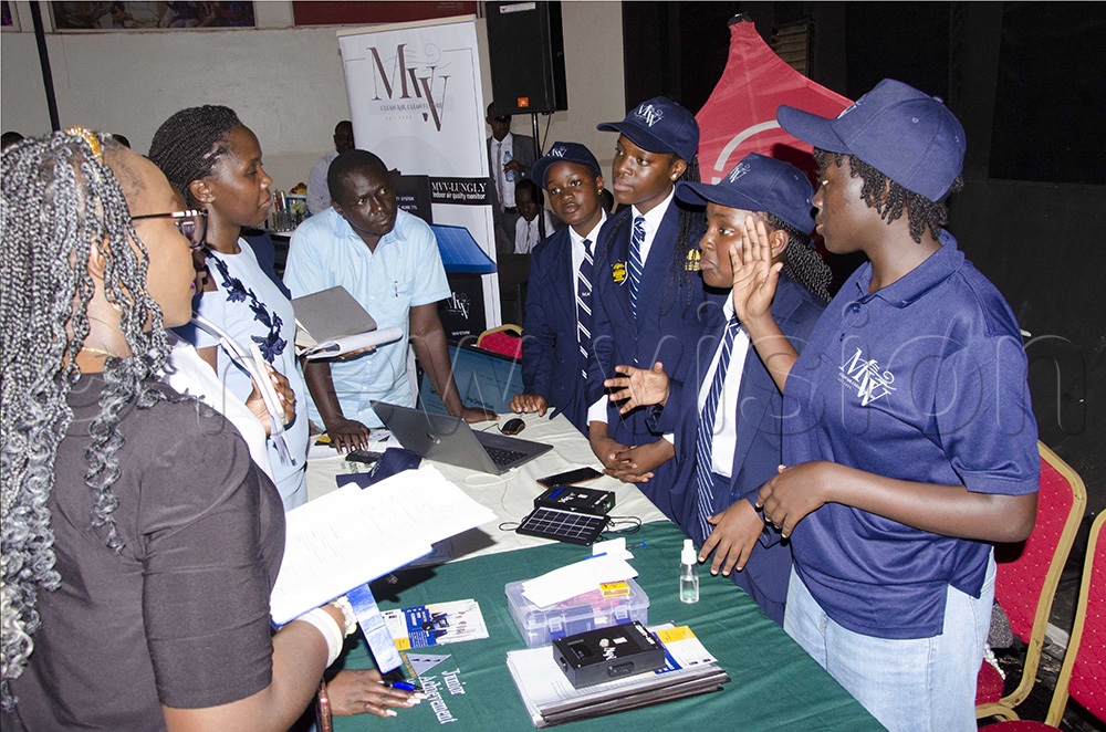 Cresta International Christian School team under their MVV JA Company explaining to the judges how their innovative products, the MVV Lungly and MVV Storm work. They emerged the first runner-up. (Photo by Colleb Mugume)