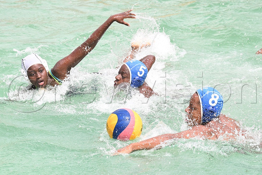 Juniors action between Elite High School (blue caps) and the Shree Sahajanand School during the 4th Uganda National Waterpolo Championships at the Elite High School pool, August 8, 2026. Shree won 5-4. Photo by Michael Nsubuga