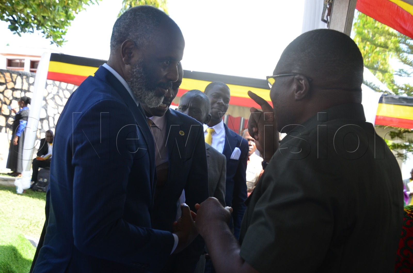 Oboth-Oboth sharing a moment with Executive Director, National Planning Authority, Dr Joseph Muvawala.