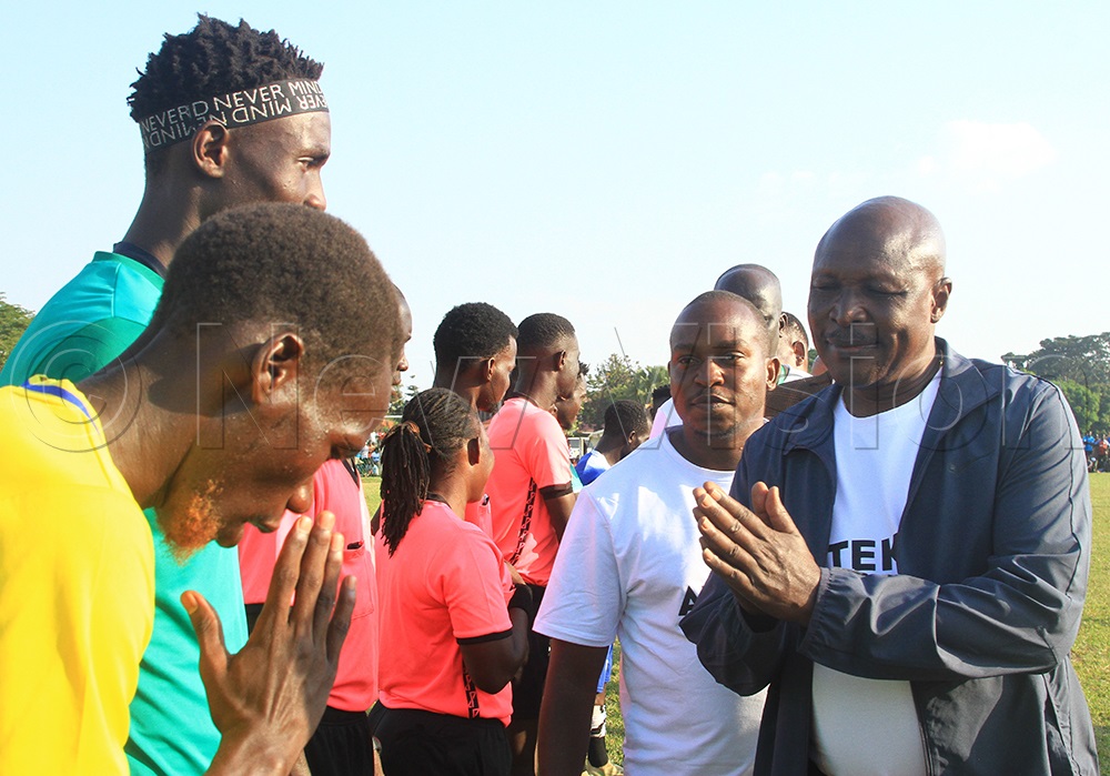 South Sudan’s Eastern Equatoria State Governor, H.E. Louis Lobong Lojore, shares a moment with tournament players upon his arrival at Oligoi Stadium on Wednesday, escorted by Ateker Cup of Nations CEO Isaac Olupot (behind). (Photo by Alfred Atwau)