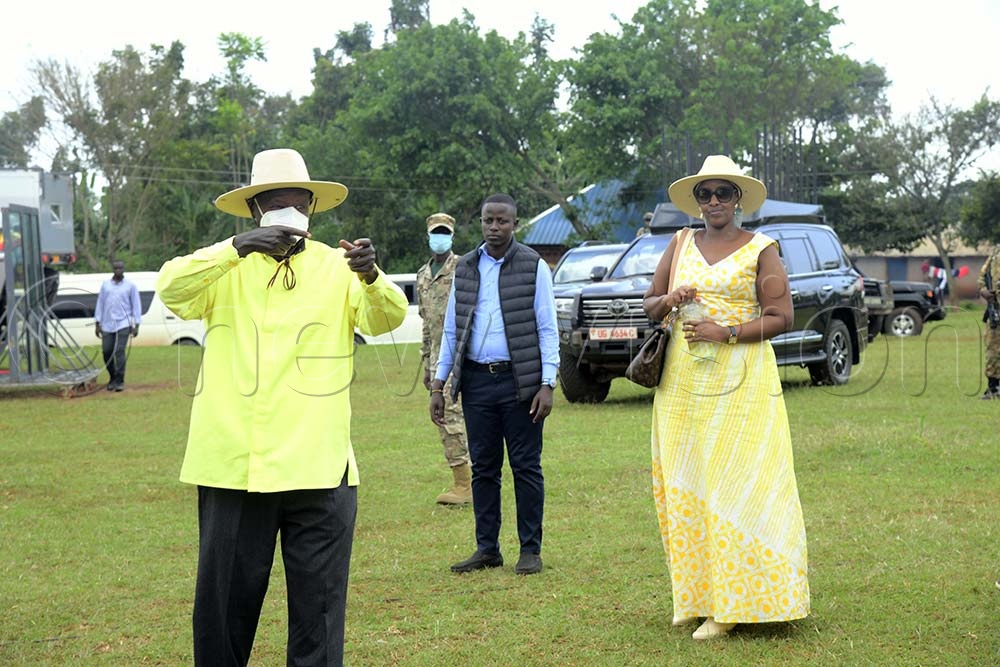 Museveni making a gesture of how he narrowly shot the Manafwa NRM district chairperson, Charles Walimbwa in 1973 when he tried to intercept him as he was being chased by Amin’s soldiers in Manafwa district last Thursday. Museveni was accompanied by his daughter, Natasha Museveni Karugire. (Credit: Eddie Ssejjoba)