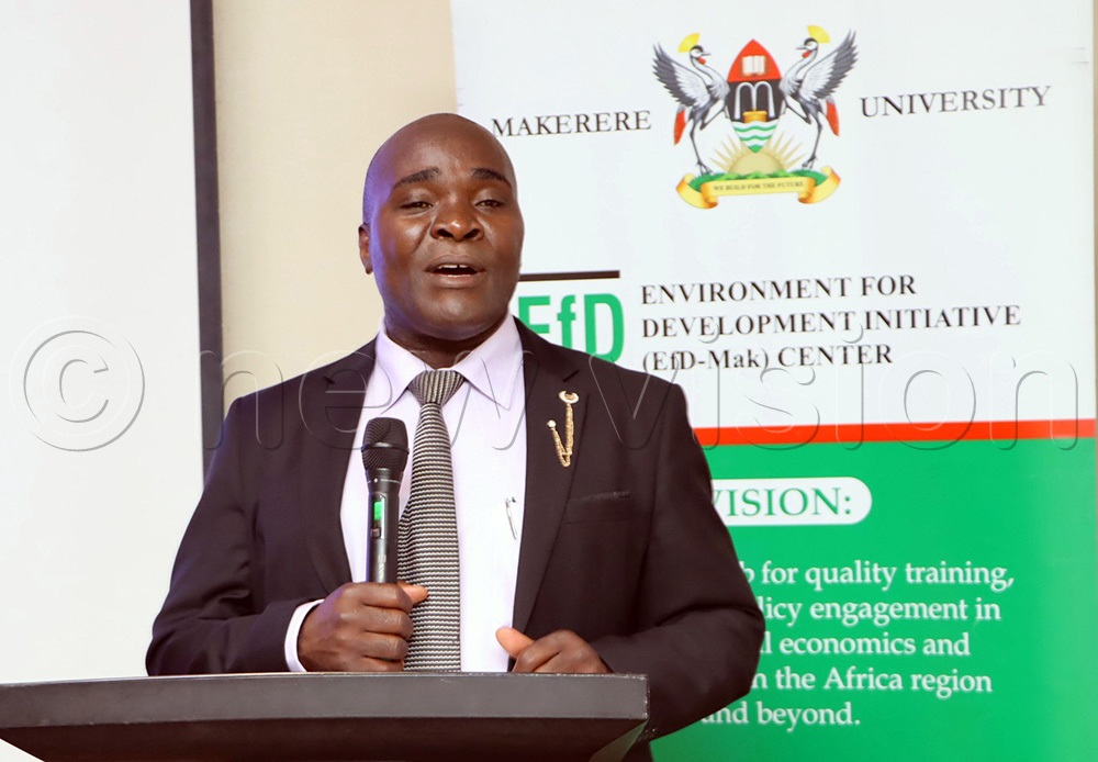 Dr. John Sseruyange from the EfD Mak Centre addressing participants. (Photo by John Odyek)