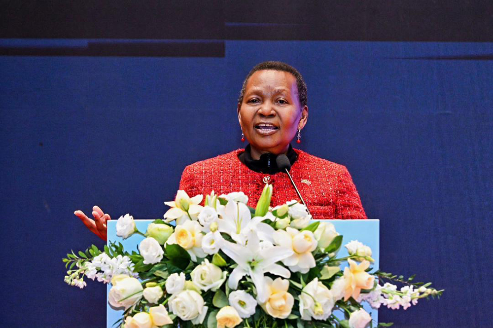 Amb. Oliver Wonekha, Head of Mission, Beijing, China, giving her remarks at the Uganda - Qingdao First Agricultural Trade and Investment Conference in Qingdao, Shandong Province, China on December 10, 2025. (Courtesy)