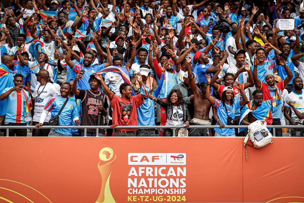 Supporters of the Democratic Republic of Congo cheer in the stands ahead of the African Nations Championship (CHAN) group stage football match between Kenya and Democratic Republic of Congo at Kasarani Stadium in Nairobi, on August 3, 2025. 