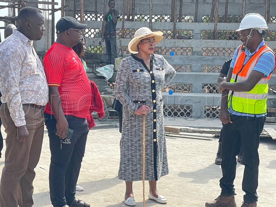 Anita Among inspects progress of the stadium. Photos by Gabriel Esiku