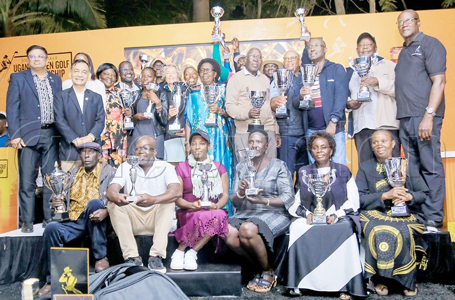 The different winners pose with the different sponsors representatives after the Johnnie Walker Uganda Open Golf Championship at the Lugazi Hills Golf and Country Club. Photo by Michael Nsubuga