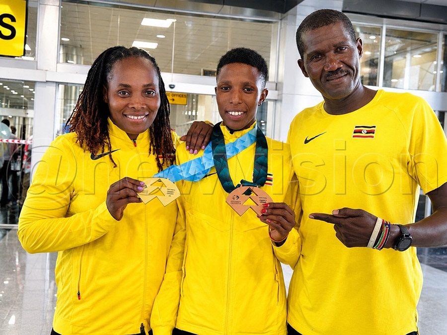 Coach Immaculate Chemutai (right), Charity Cherop (centre) and coach Jimmy Adhar