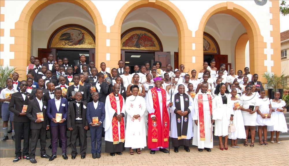 The Archbishop of the Church of Uganda, Dr. Samuel Steven Kaziimba Mugalu (holding a crosier) with the students of Makerere College School that he confirmed at St. Francis Chapel, Makerere University.