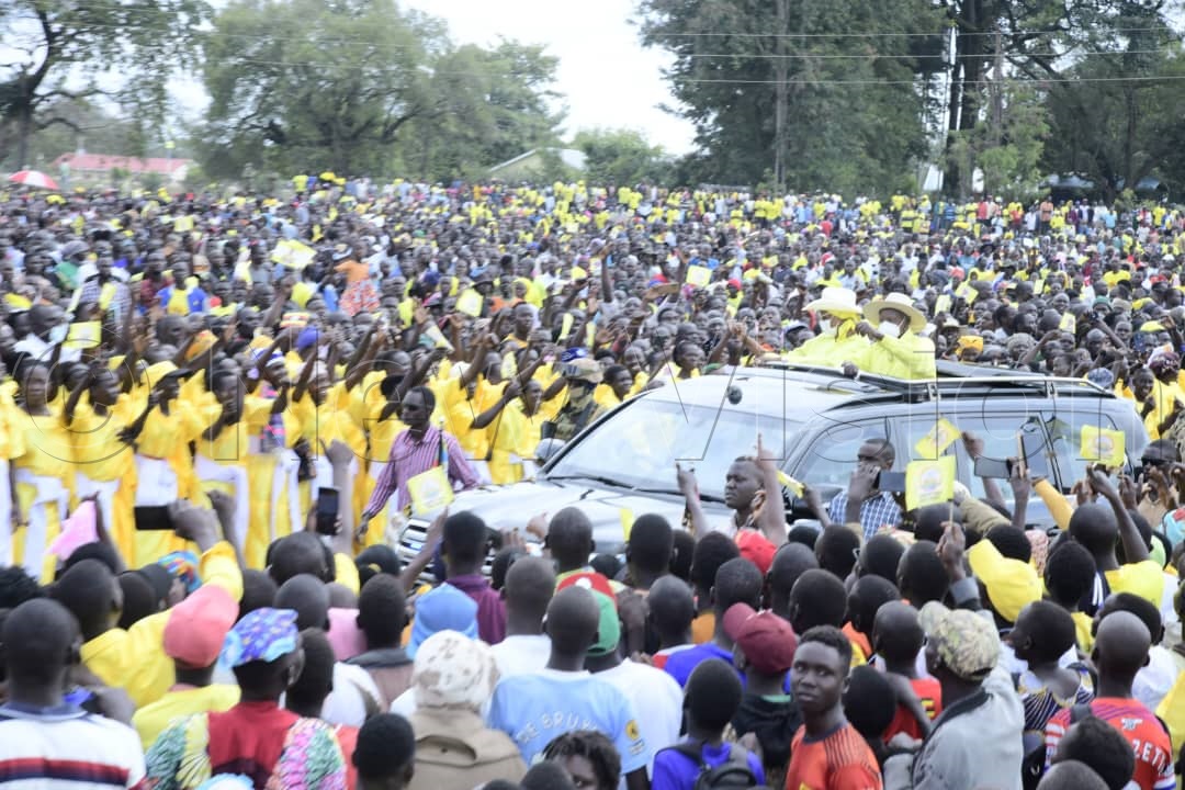 President Museveni accompanied by the First Lady and Minister of Education and Sports, Maama Janet Museveni, arrive for the rally.