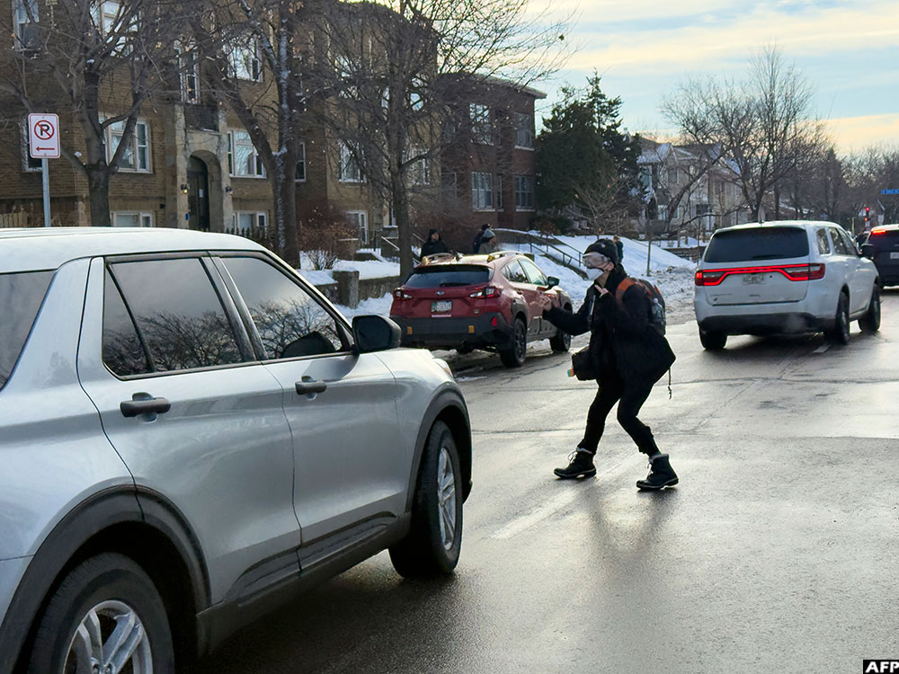  A protester reacts as federal agents leave the scene where a federal immigration agent shot dead a woman in Minneapolis