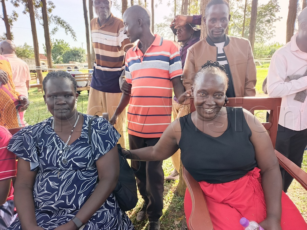 The two candidates Lillian Alum and Ruth Mubeezi (R) who tied with 68 votes for the Jinja distruct female workers seat on Wednesday. (Photo by Jackie Nambogga)