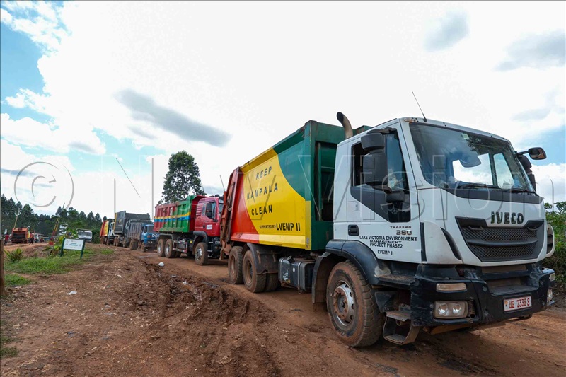Some of the KCCA trucks at Buyala site. (Credit: Eddie Ssejjoba)