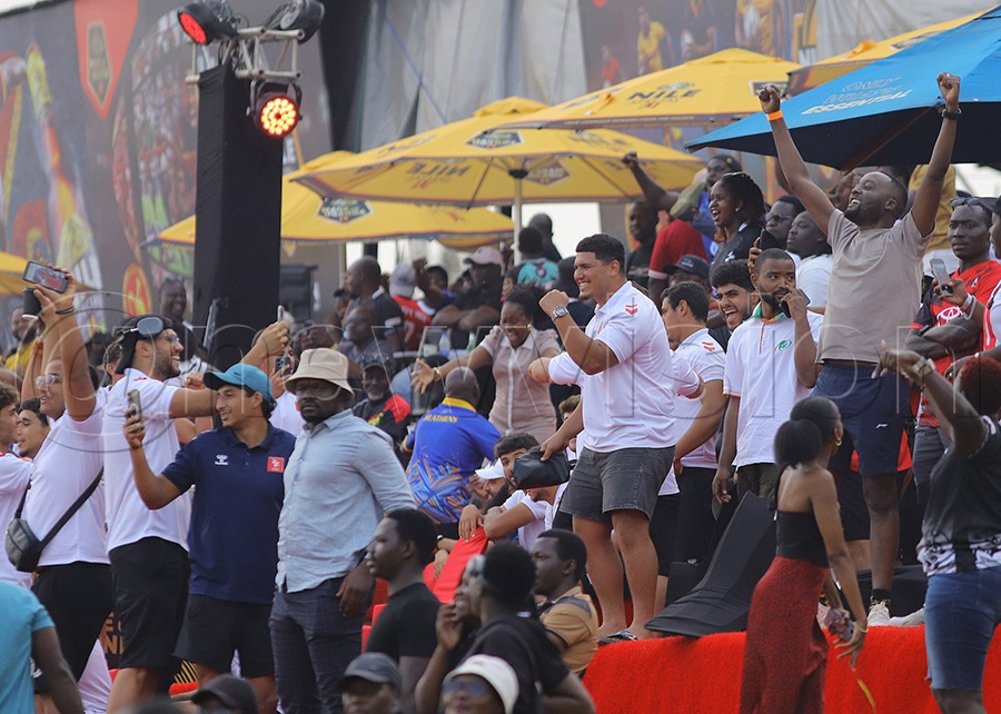 Tunisian fans cheer on their team during the women's rugby final at Kings Park Arena in Bweyogerere. PHOTO: Johnson Were
