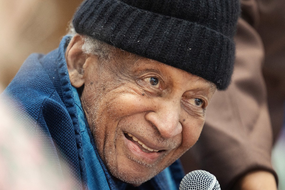 South African pianist and composer Abdullah Ibrahim reacts during a press conference during the Cape Town International Jazz Festival (CTIJF) in Cape Town on March 26, 2026. World-renowned South African jazz pianist and composer Abdullah Ibrahim has died Monday at the age of 91 in Germany, his family announced in a statement. (Photo by GIANLUIGI GUERCIA / AFP)