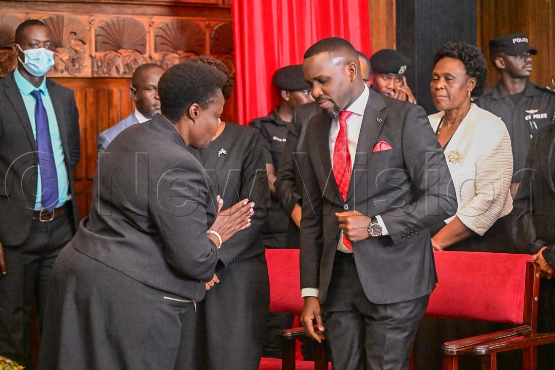 Vice President Jessica Alupo welcomed by Leader of Opposition in parliament, Joel Ssenyonyi.