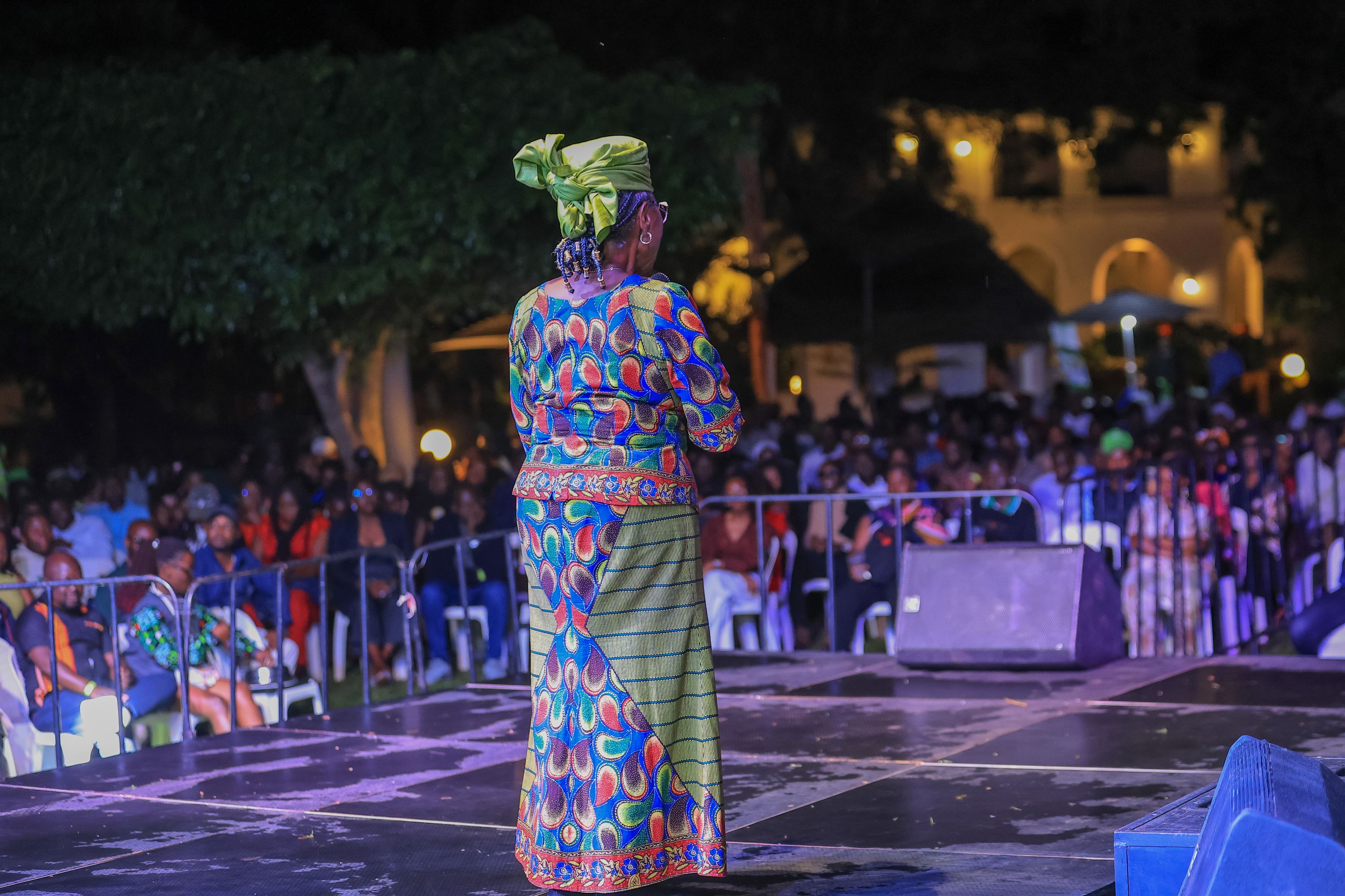 Angelina Wapakhabulo thanks the fans who braved the rain for the concert. Photo by Paul Watala