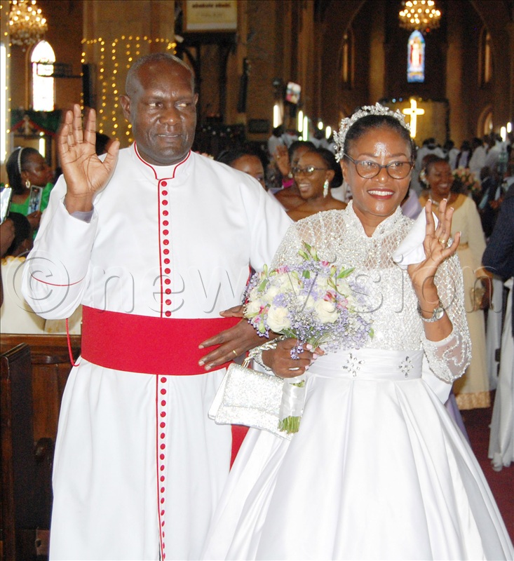 The Kiwanukas in recession from Namirembe Cathedral after their 25th wedding anniversary thanksgiving service on December 30, 2025.