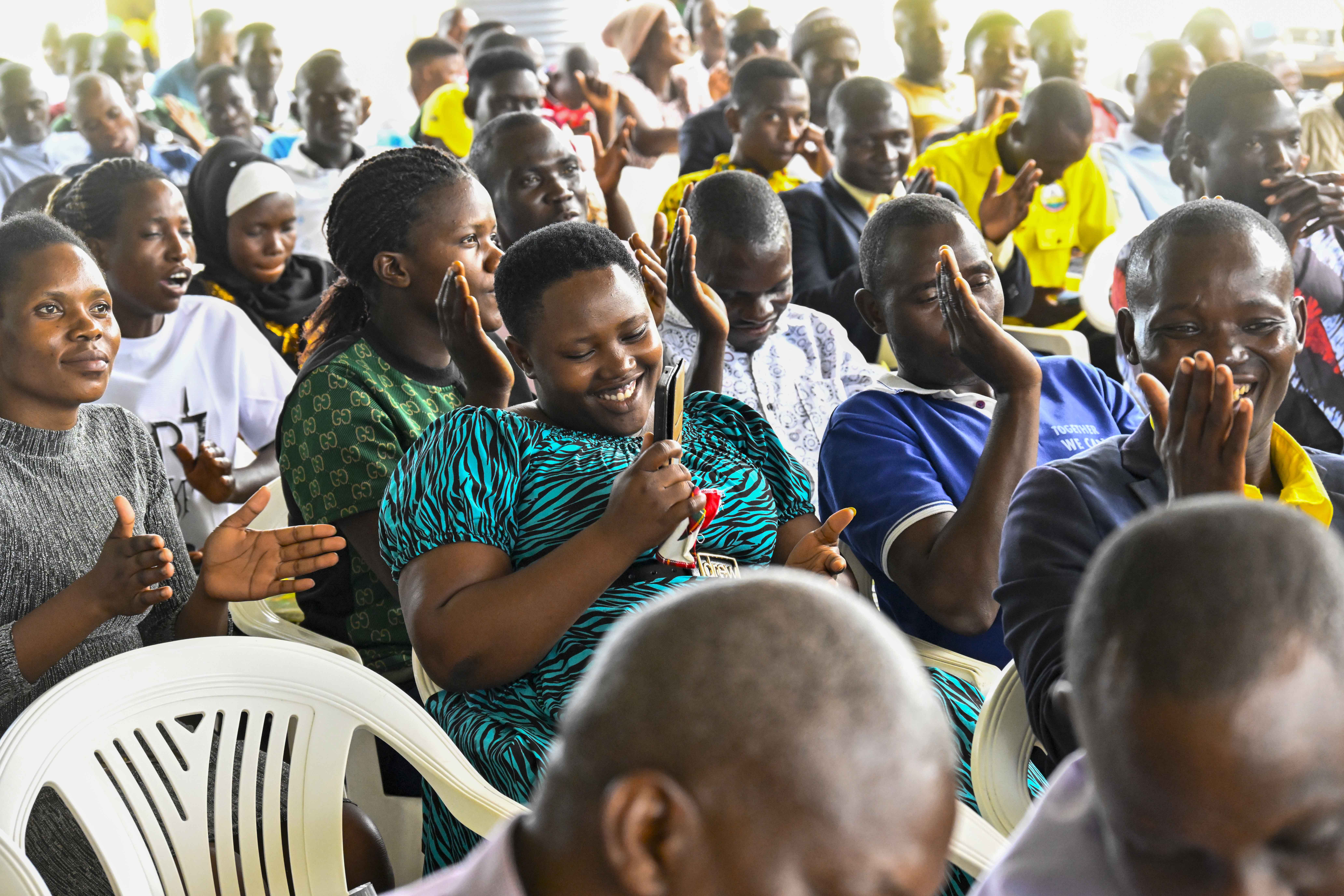 Some of the excited former students attending a Training for Regional President Industrial hubs of Bukedi, Busoga and Bugisu SACCO leaders on Management of the SACCO funds from President Yoweri Kaguta Museveni at Bukedi sub-region Industrial hub in Lwatama sub-county, Kibuku district.