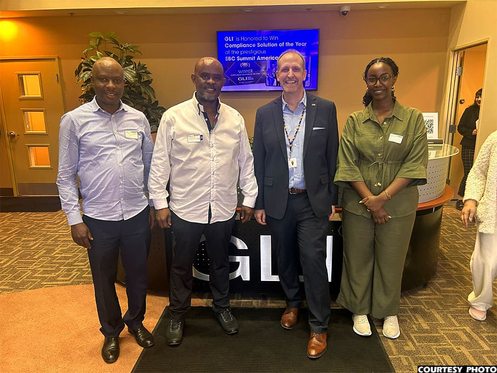 The writer, Kitariko (2ndL), was accompanied by board member ACP Paul Mark Odong (L) and senior manager of licensing Alicia Atukunda (R)