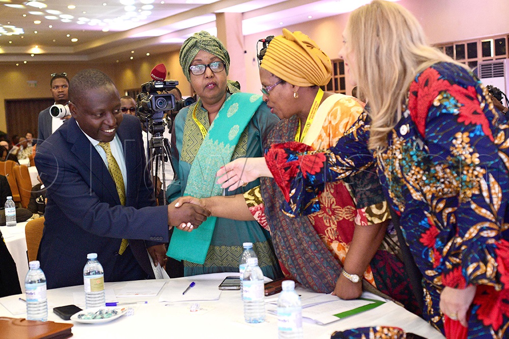 Industry trade minister, David Bahati, greeting guests at the event. (Credit: Maria Wamala)