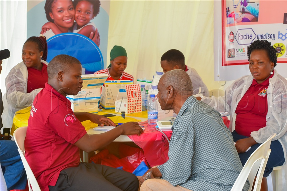 Health officials conducting sickle cell screening at Jinja City Square during the national commemoration.