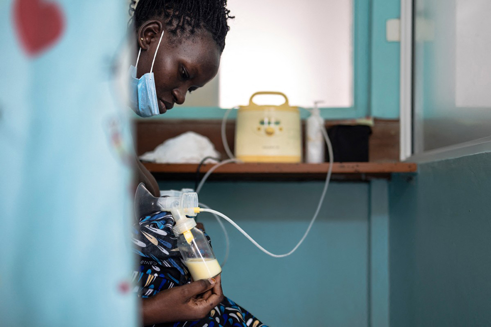 A lactating mother donates her surplus breastmilk at Kenya's only breastmilk bank at the Pumwani Maternity Hospital, Nairobi on September 4, 2025. (Photo by Tony KARUMBA / AFP)