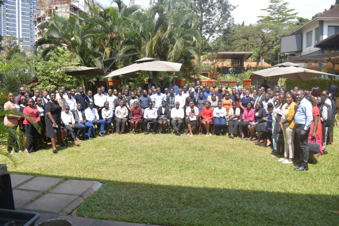 Apprentices and graduate volunteers pose for a group photo at Fair Way Hotel.