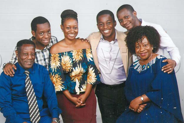 Prof. Lubega (left) with his wife and children.