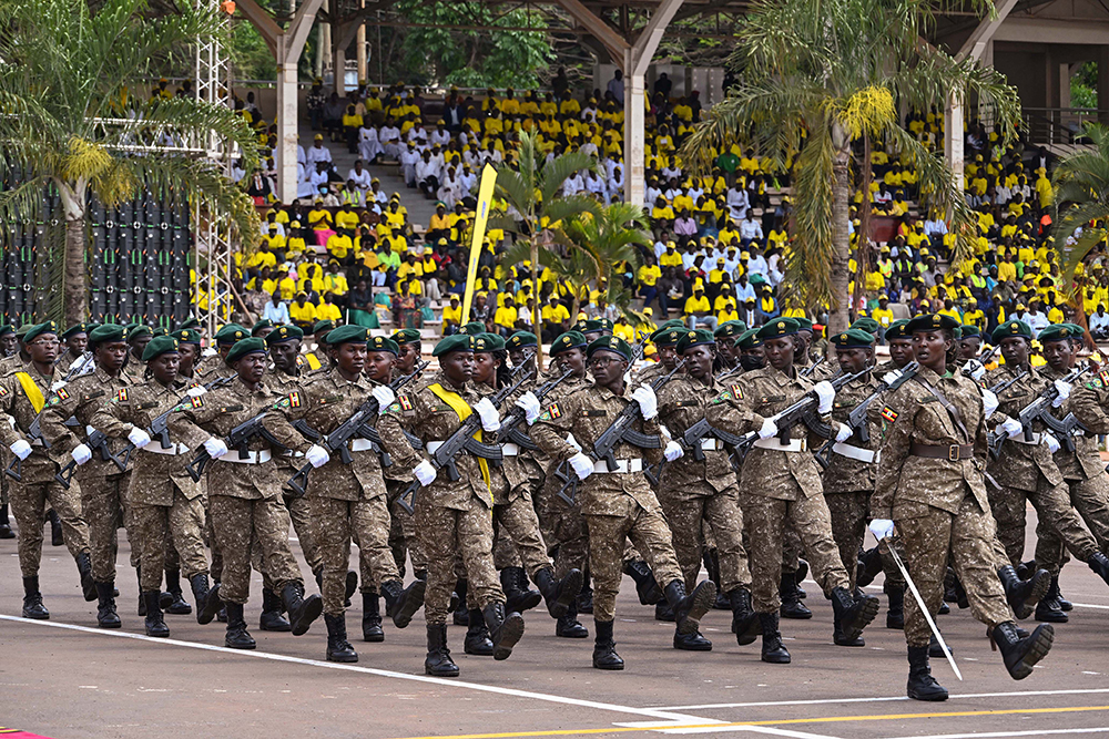 Military officers and men marching during the NRM Liberation day celebrations at Kololo on Monday. (PPU Photo)