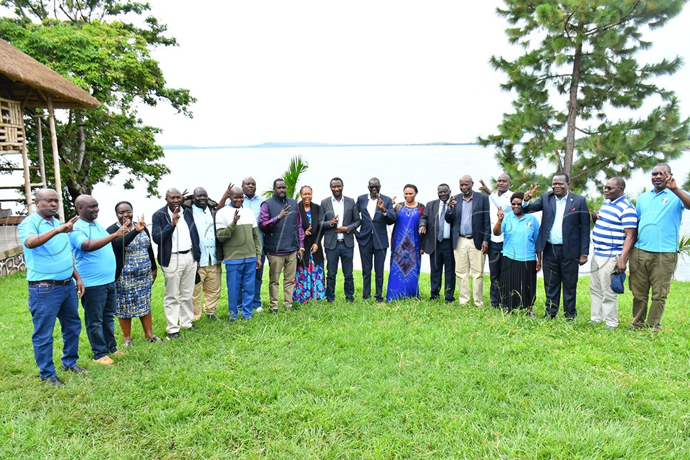 FDC-elect Members of Parliament and working committee members in a group photograph during a retreat at Mountain Inn at Kiyindi landing site in Buikwe district on May 10th. (Photo by Donald Kiirya)