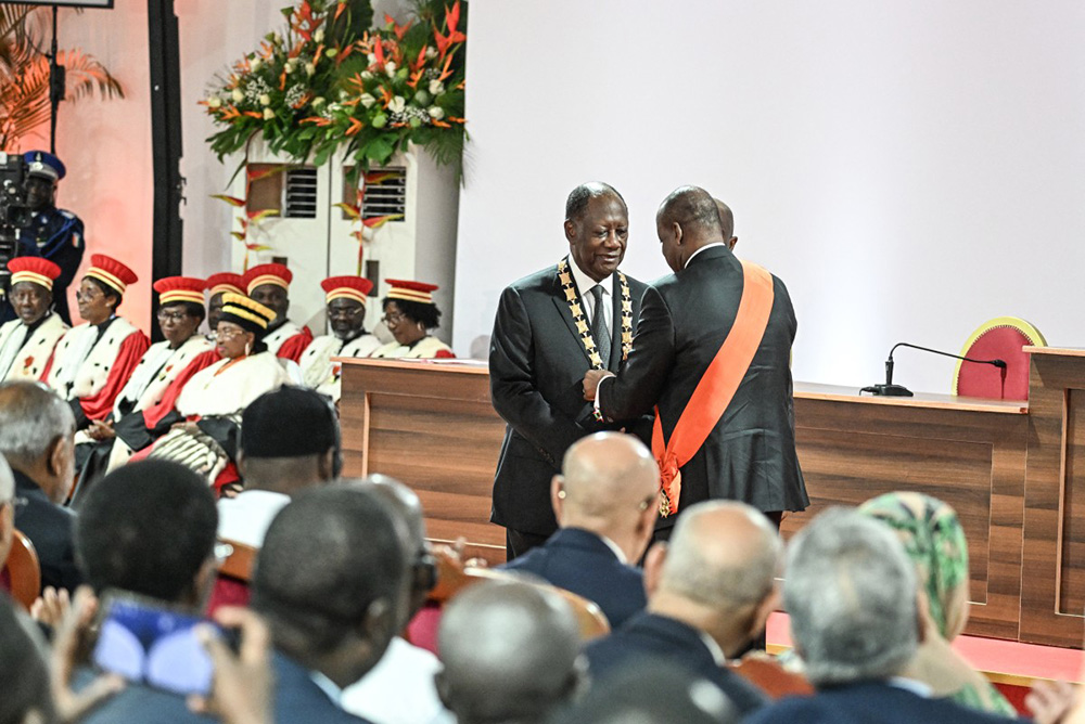 Ivory Coast President Alassane Ouattara is inaugurated at the Presidential Palace in Abidjan on December 8, 2025. (Photo by SIA KAMBOU / POOL / AFP)