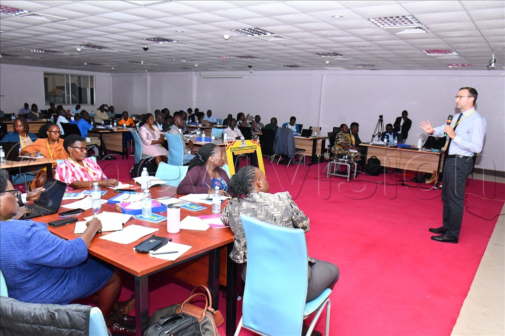 Dr. Tillmann Guenthes (right), the Adolescent Development Manager at UNICEF Uganda facilitating a topic about life skills during the two-day Life Skills Learning event at Civil Service College, Uganda in Jinja City which started on March 25.   