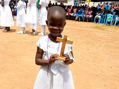 Joan Faith Apio during a church service last year. She is a catholic. (File)