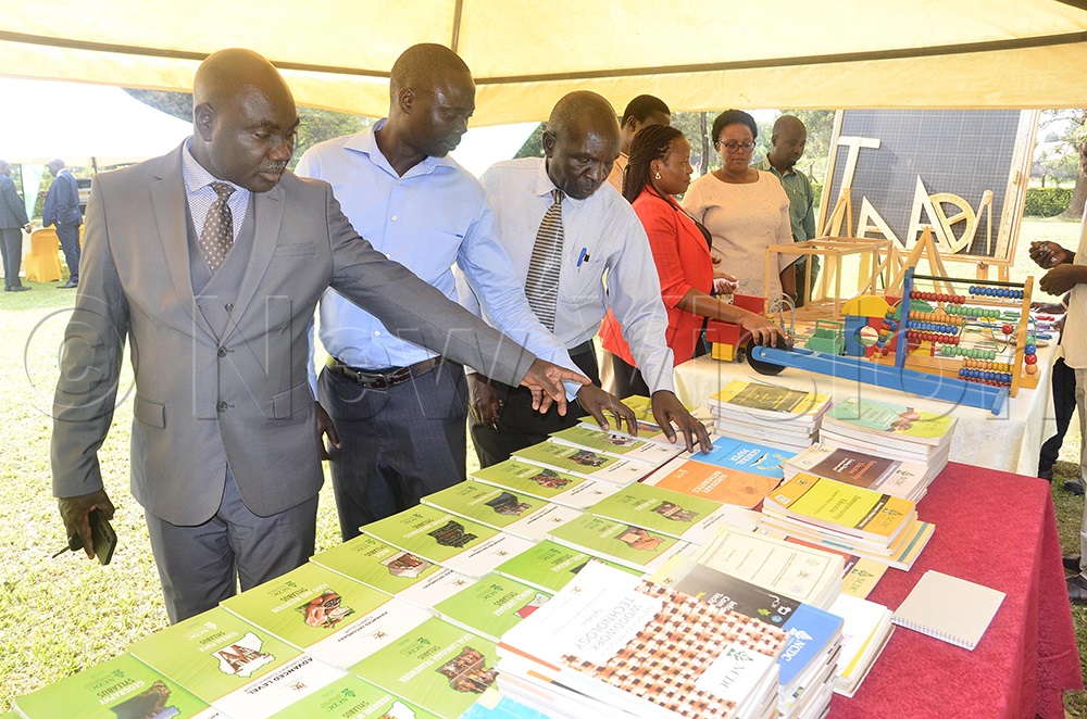 A teacher inspects some of the materials used in early childhood education during an exhibition at the pre-conference for the forthcoming 2nd International Conference at the National Curriculum Development Centre (NCDC) in Kampala on August 18, 2026. (Photo by Wilfred Sanya)