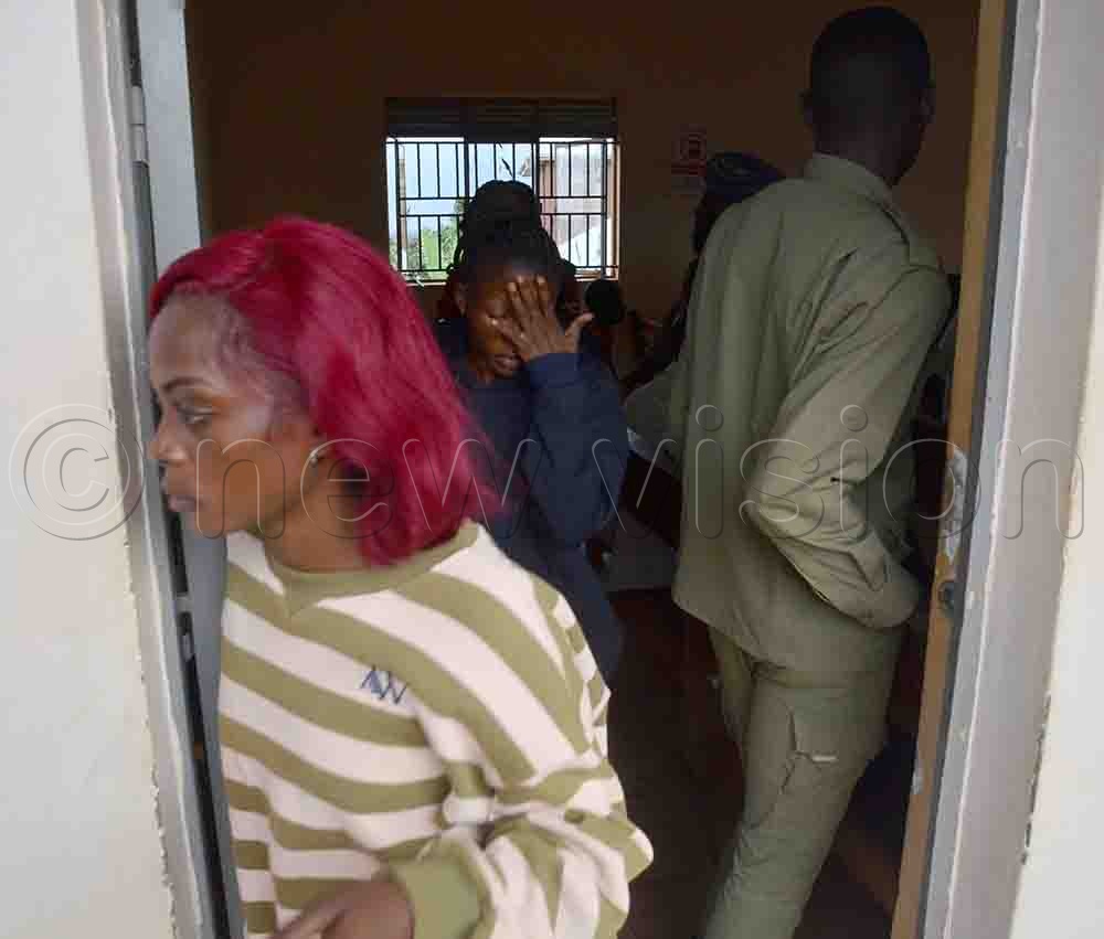 Vivian Kobela, and Martha Lubango leaving Kira Chief Magistrates court on Friday, June, 5, 2026. (Credit: Stuart Yiga)
