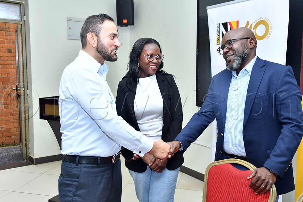 Vision Group CEO Don Wanyama interacts with Bhagwani Nitin of The Looks Ltd &rsquo; and Allen Byonanebye of Judy&rsquo;s Bridals (Centre) during a Bride & Groom Expo feedback session with stakeholders at Piato Restaurant,Wednesday, April 22, 2026. (Photo by Richard Sanya)
