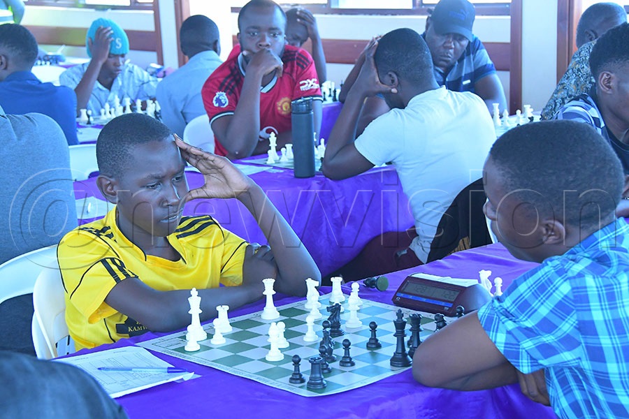 Chess players compete in the Open category at the 2026 SOM Easter Chess Tournament in Makindye. Photo: Silvano Kibuuka