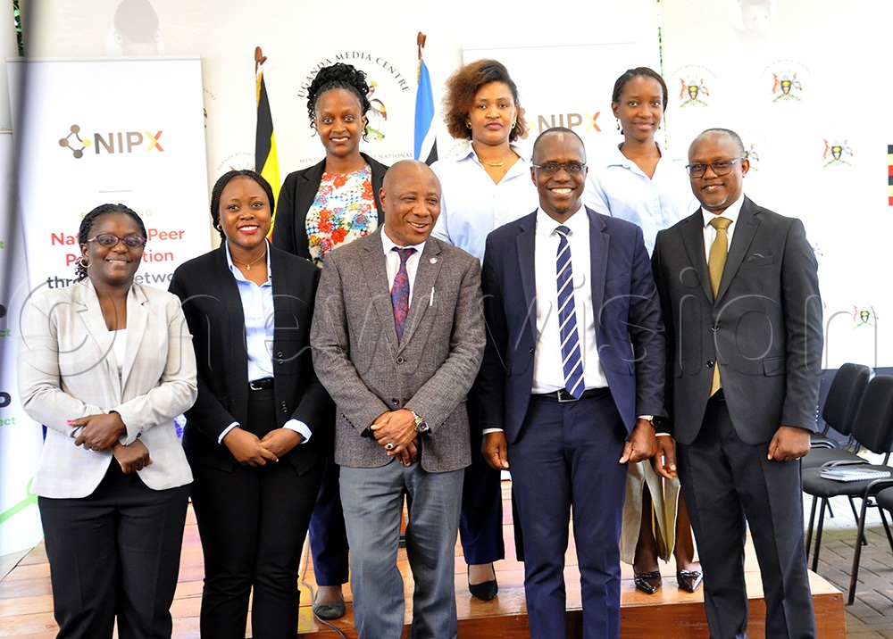 (R-L): Godfrey Sserwamukoko, Chairperson Internet Service Providers Association, Richard Obita, the Director Technical Services NITA-U, Godfrey Kabbyanga State Minister for Ministry of ICT and other officials pose for a photo after a press conference at the Uganda Media Centre on April 14, 2026. (Photo by Nancy Nanyonga)
