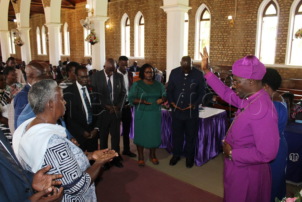 Rt Rev. Fred Sheldon Mwesigwa blessing the nomination committee which was instituted on Thursday at St.James Cathedral. (Photo by Abdulkarim Ssengendo)