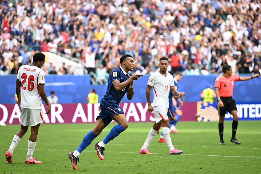 France's forward #10 Kylian Mbappe celebrates scoring his team's third goal during the 2026 World Cup football tournament third-place match between France and England at the Miami Stadium in Miami on July 18, 2026. (Photo by CHANDAN KHANNA / AFP)