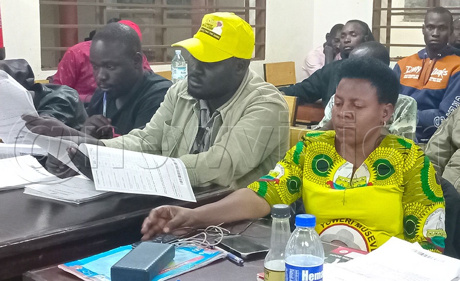 Patrick Ipalat (middle) the NRM chairperson of Kapelebyong district seated with Jacinta Atuto who won the woman MP race. Photo by Alfred Atwau