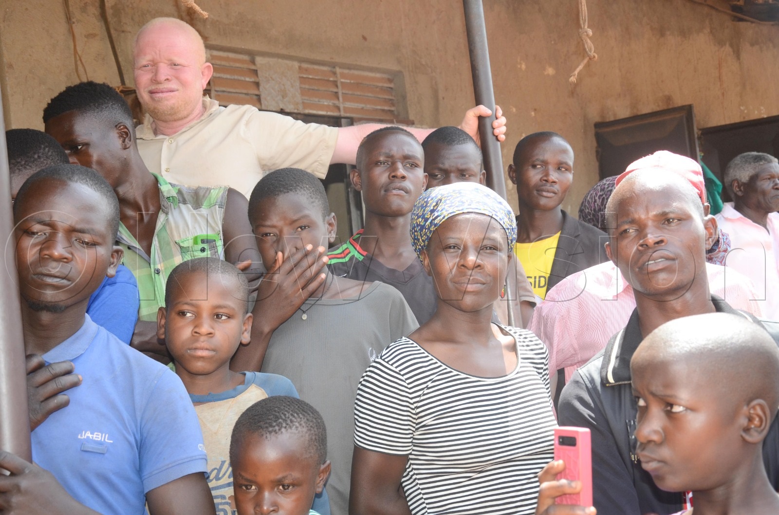 Voters listening in at Muntu's campaign rally.